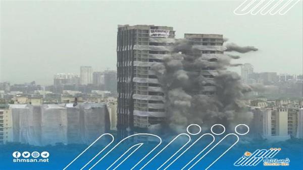 شاهد بالصور لحظة تفجير ناطحتي سحاب في نيودلهي 